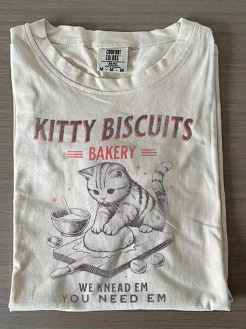 Whimsical Unisex Kitty Biscuits Bakery Graphic T-Shirt, Retro Kitten Baking Print Casual Summer Crew Neck Short Sleeve Top Baking Lover 100% Cotton